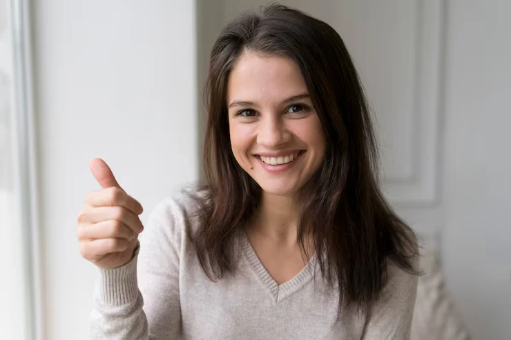 woman-showing-ok-sign_23-2148990150